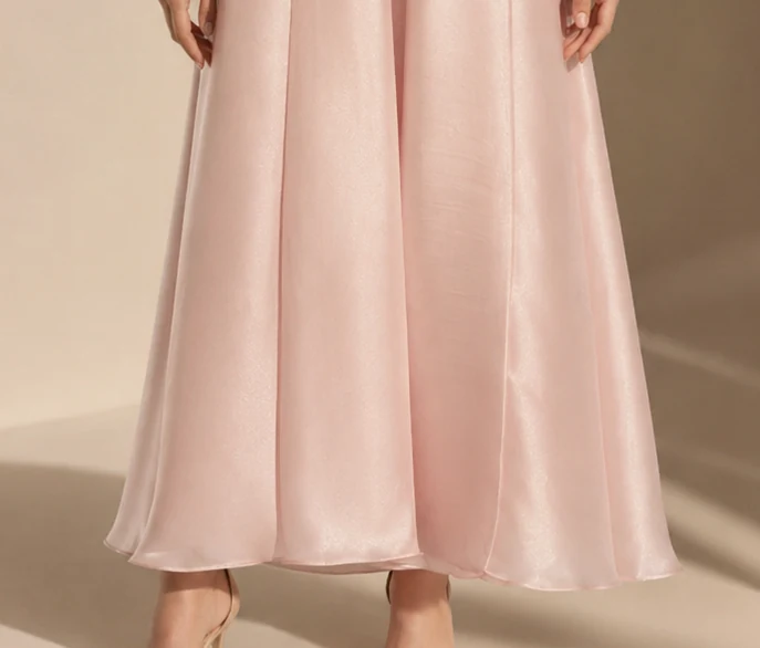 Close detail of the satin drape at the front opening.