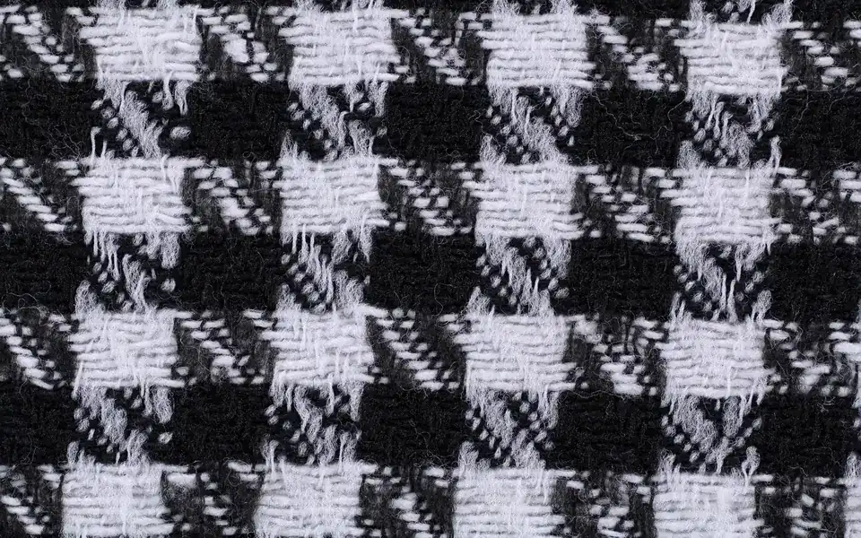 Close-up of black and white houndstooth woven fabric
