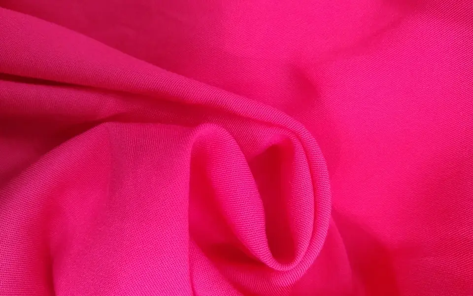 Pink rayon challis swirled to show its drape
