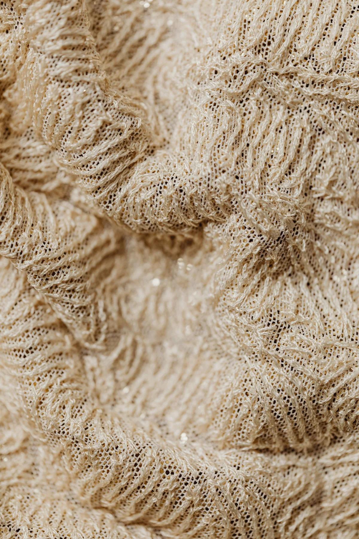 Illustrative: folds of fine fabric in natural light. Licensed stock photograph, not our own product.