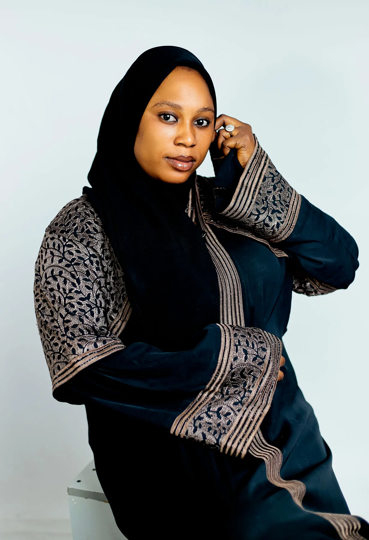Illustrative: an embroidered abaya. Licensed stock photograph, not our own product.