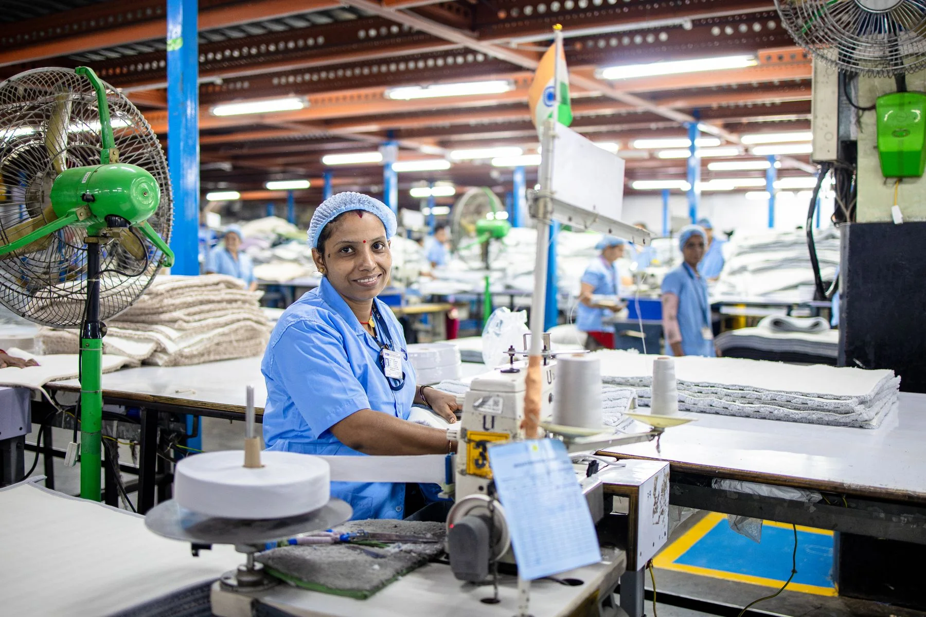 Illustrative: a machine operator at work. Licensed stock photograph, not taken during our production.